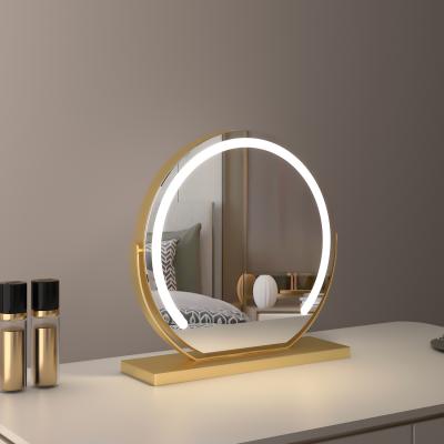 Espejo de tocador redondo grande de 40 cm para dormitorio, giratorio, 3 modos de luz, tira LED de brillo regulable, se enchufa y tiene un soporte dorado.