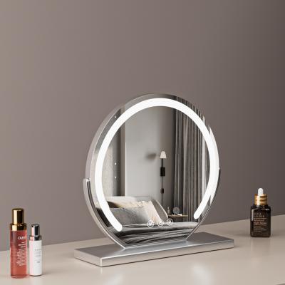 Espejo de tocador redondo grande de 40 cm para dormitorio, giratorio, 3 modos de luz, tira LED de brillo regulable, se enchufa y tiene un soporte plateado.