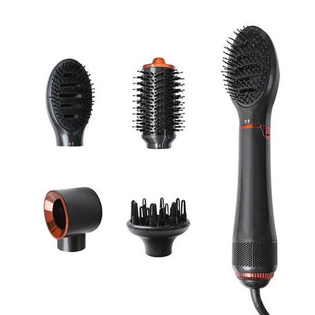 Professional hairstylist using hot air hair brush