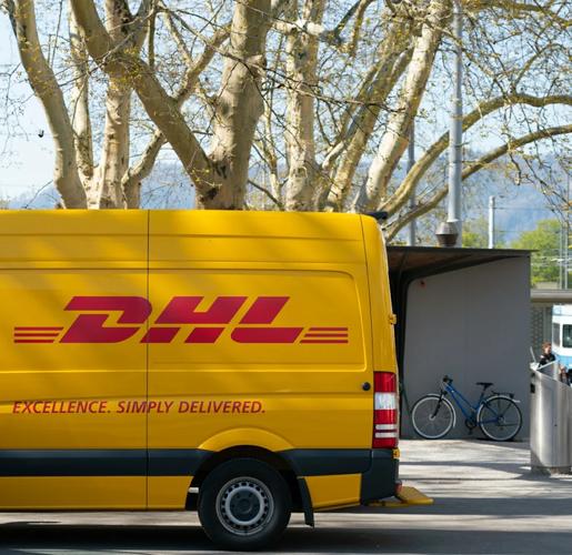 Professional using EMS Microcurrent device on athlete