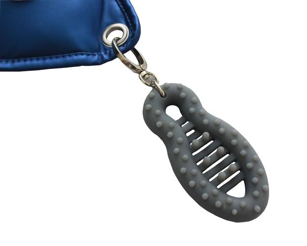 Professional using shoulder massager in office setting