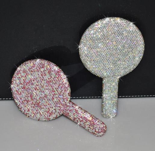 Professional makeup application with handheld mirror