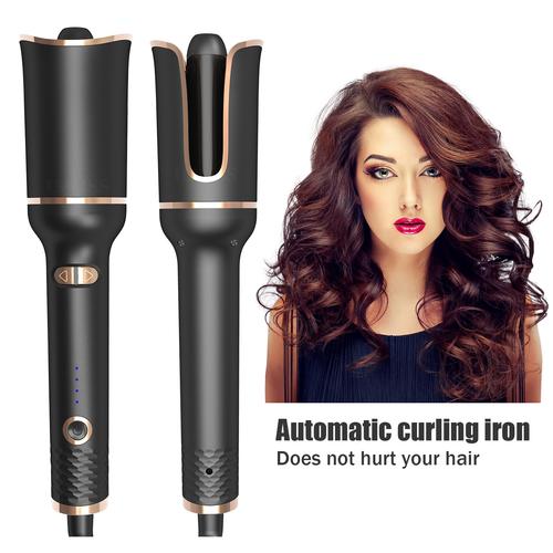 Stylist demonstrating beach waves with curling wand