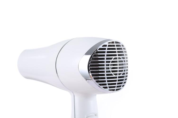 Hair dryer assembly line with quality checkpoints