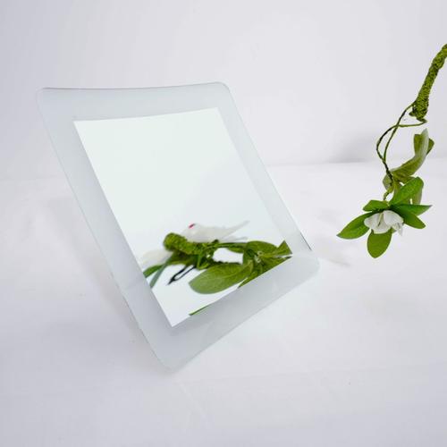 Professional makeup application with magnifying mirror