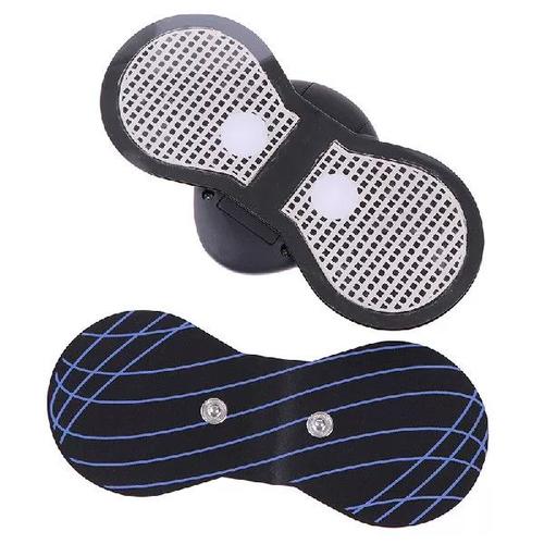 Professional using electric body massager in home office