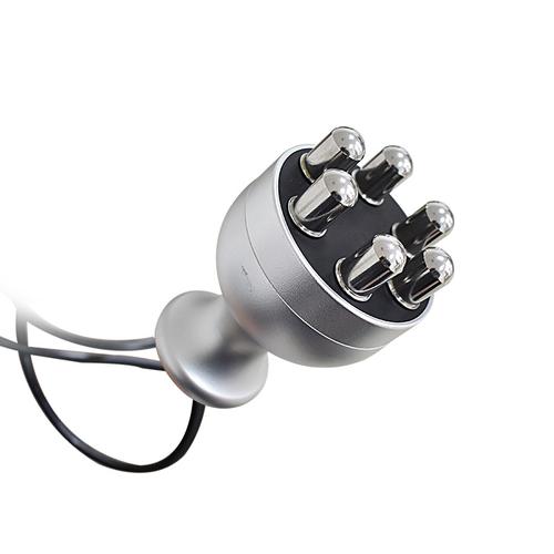 Professional using radiofrequency machine for double chin treatment