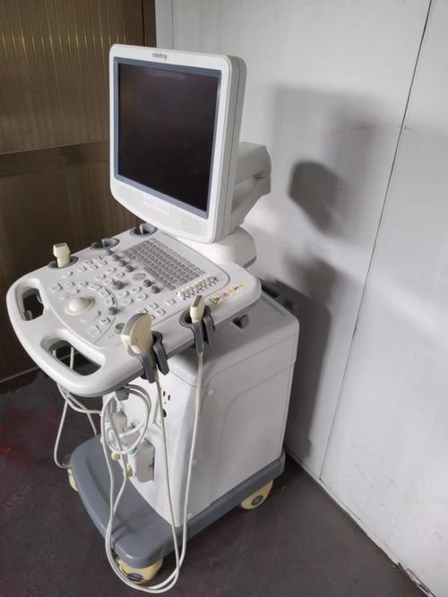 Portable ultrasound machine assembly line with quality control stations