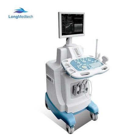 Medical professional using ultrasound equipment in clinical setting