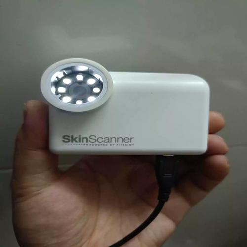 Skin scanner machine assembly line with quality control checkpoints