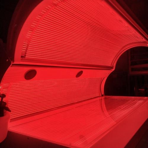 Body light therapy device assembly line with quality control checkpoints