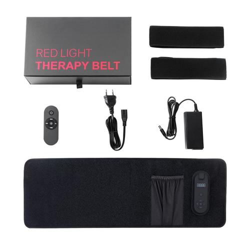 Woman using body light therapy device at home